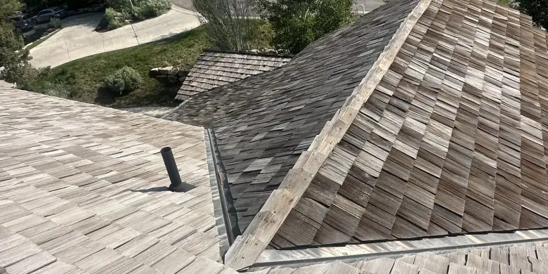Professional roof replacement in progress on a Utah home