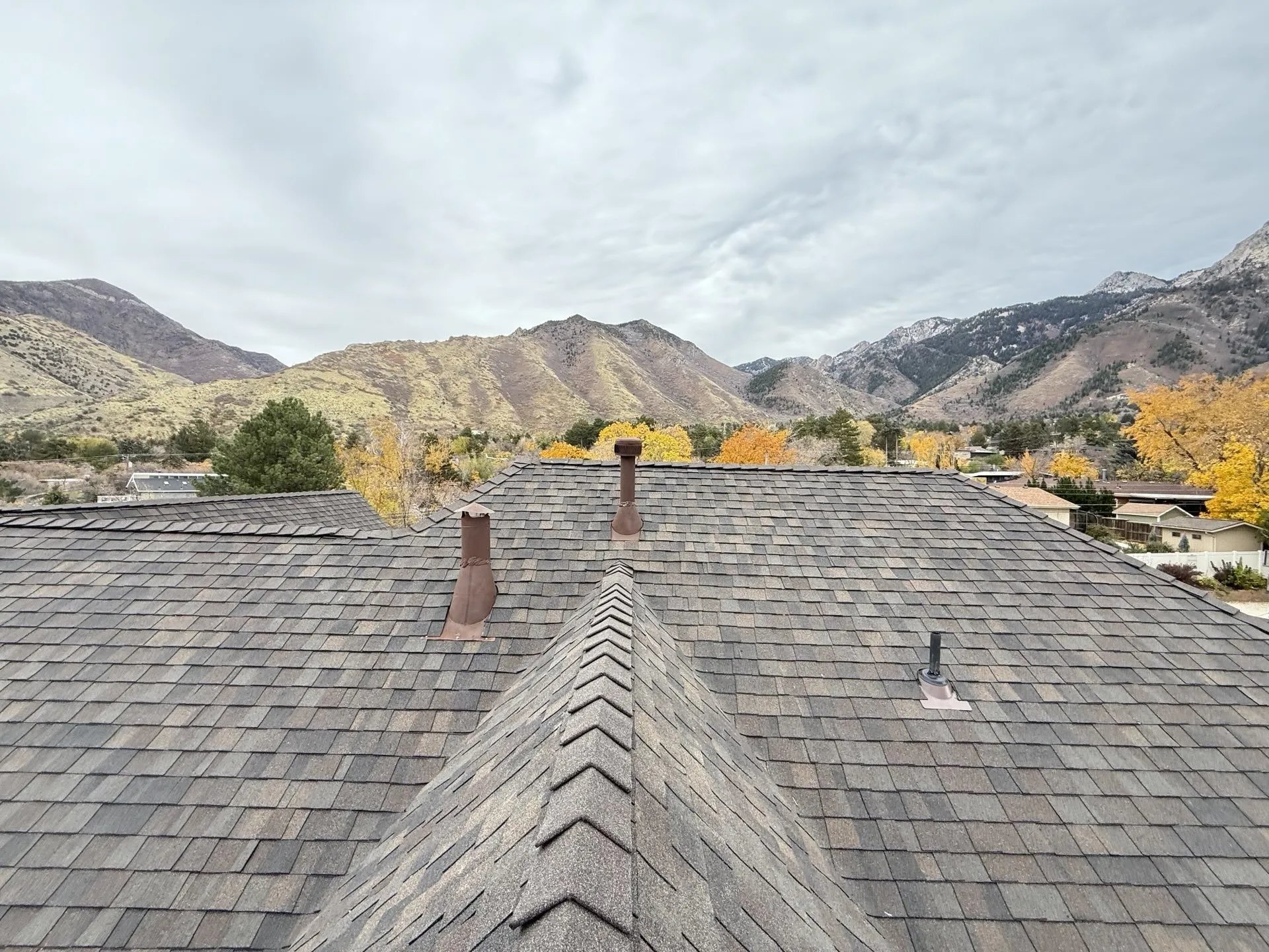 Holladay Utah east-bench home where Frame Restoration Utah repairs wind, hail, and tree-strike storm damage beneath Mt. Olympus
