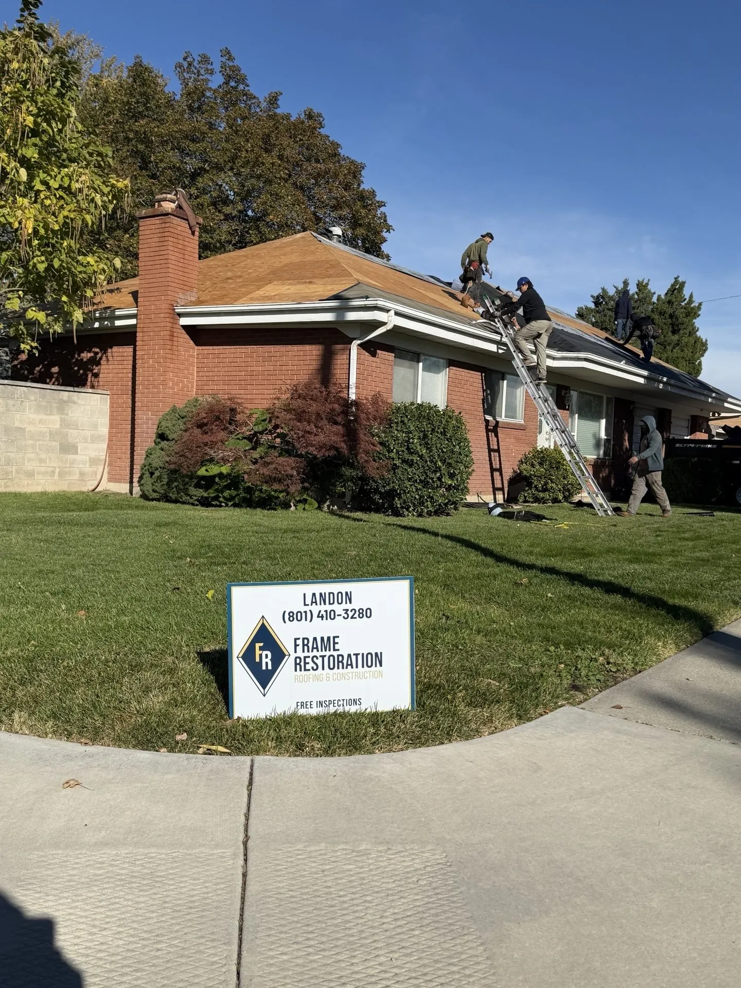 Brick home storm damage roof repair in Sandy, Utah — Frame Restoration Utah