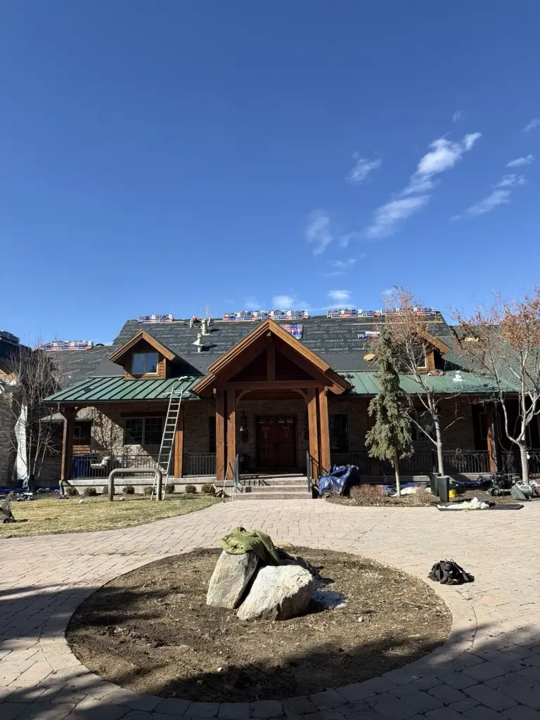 Storm damage reroof on upscale timber-frame property by Frame Restoration Utah in Utah