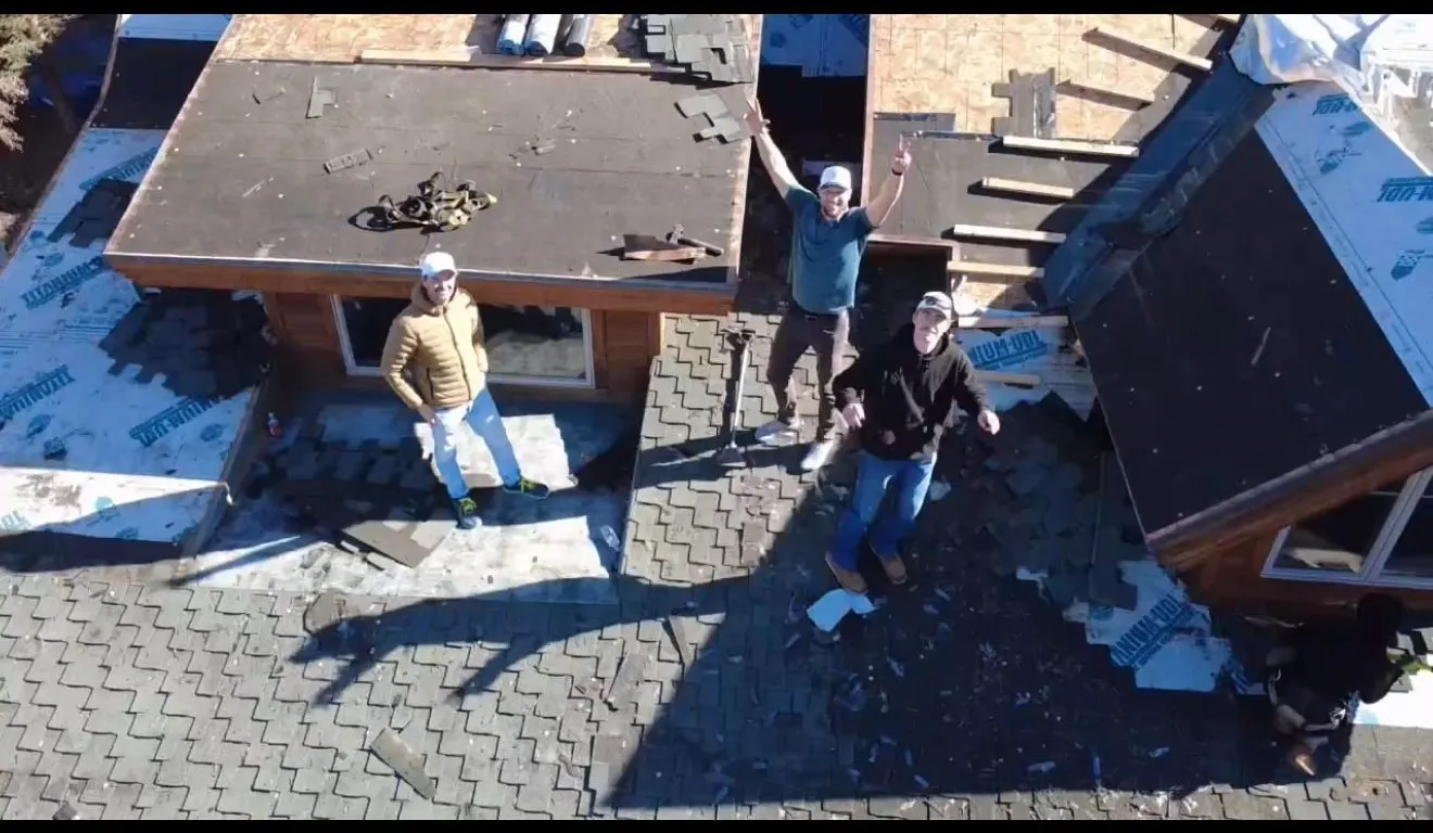 Frame Restoration Utah crew working on a rooftop in Heber Valley — licensed, insured Utah roofing contractor